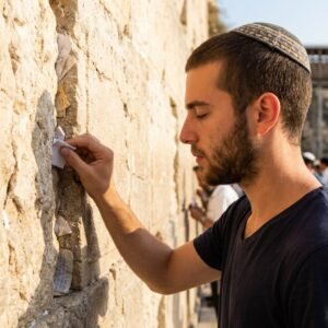 A glimmer of light between the cracks of the stones